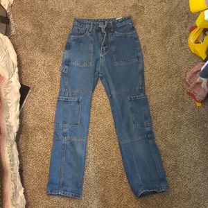 High waisted, dark, straight leg blue jeans